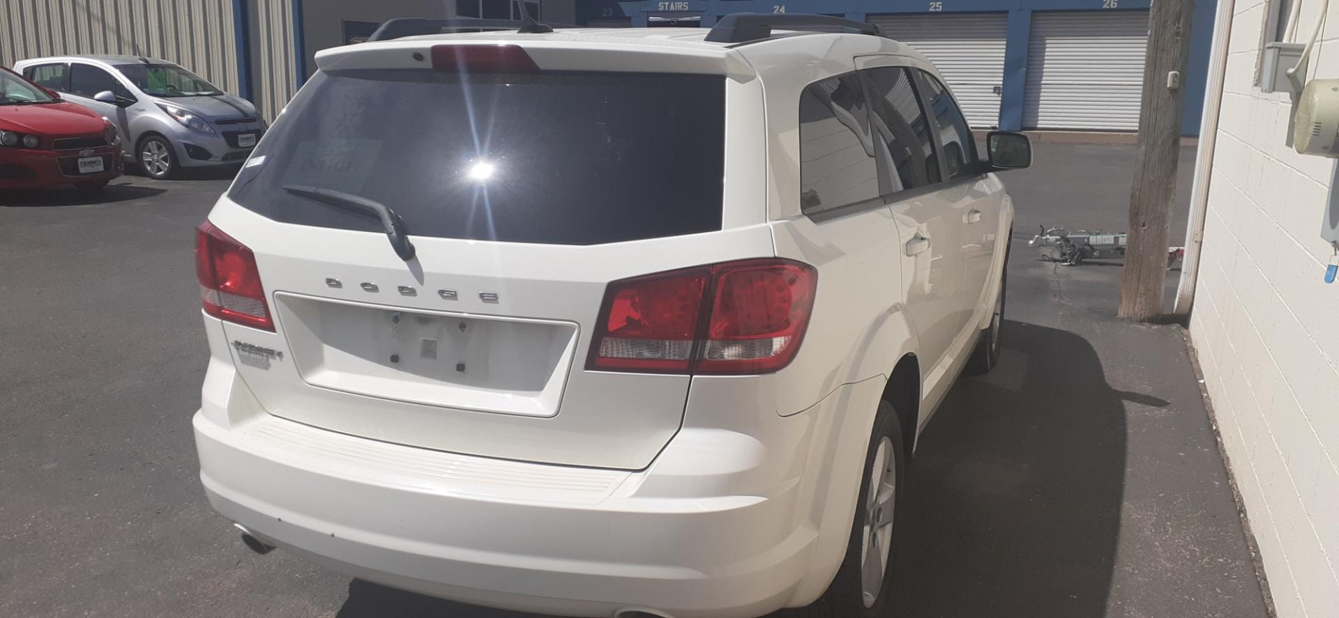 2011 Dodge Journey Mainstreet (3D4PG1FG2BT) with an 3.6L V6 DOHC 24V engine, 6-Speed Automatic transmission, located at 2015 Cambell Street, Rapid City, SD, 57701, (605) 342-8326, 44.066433, -103.191772 - CARFAX AVAILABLE - Photo#3